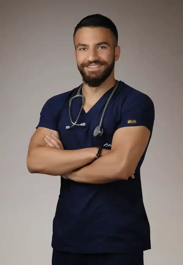 Dr. Mustafa Fırat'ın lacivert forma ile çekilmiş portresi